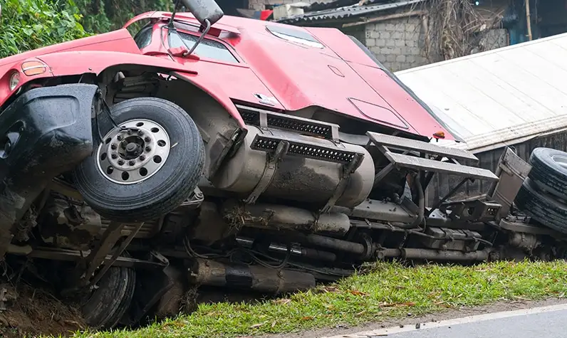 a truck lying on the roadside